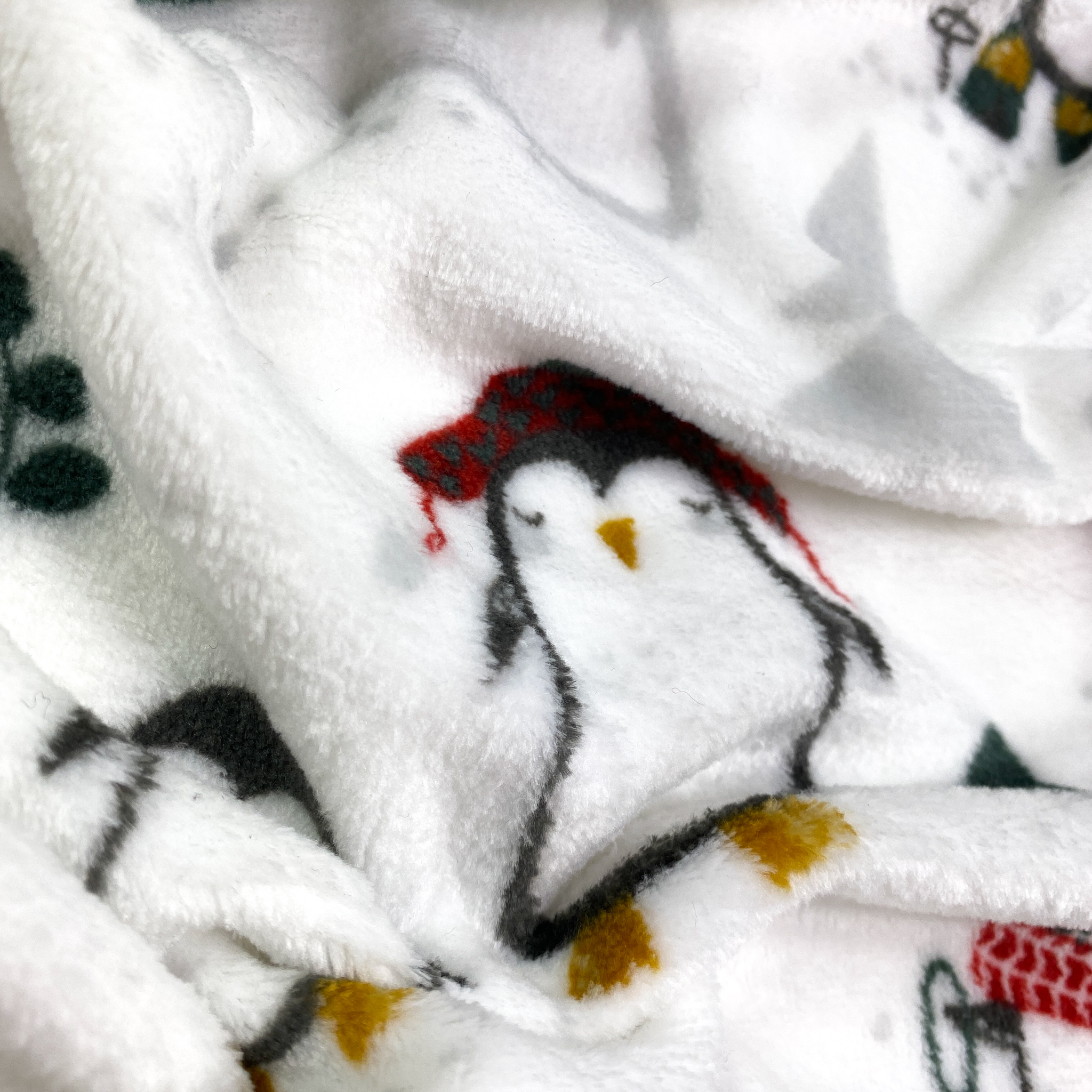 Wellness Fleece mit Pinguinen – JP Stoff Export